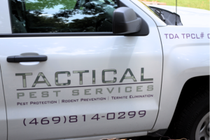 Close up on Tactical Pest Services Car